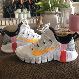 Nike Metcon white with orange,red, pink & black and white back.  Size 8.5 US